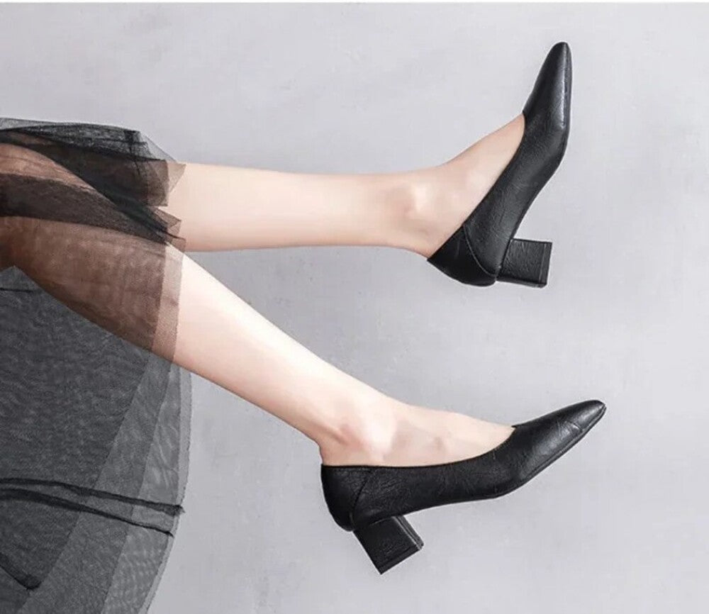 Women's black low heel pumps