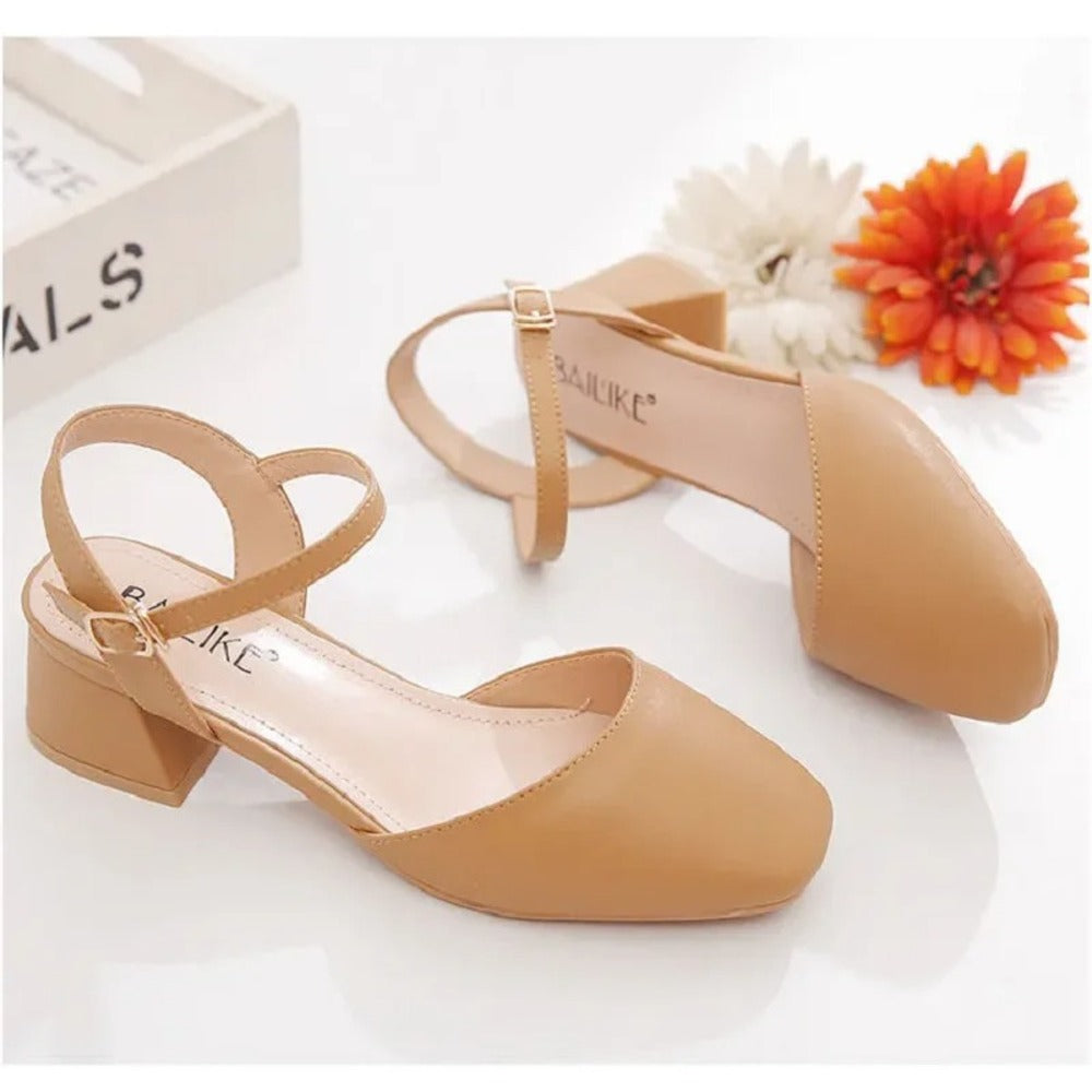 Beige women's pumps