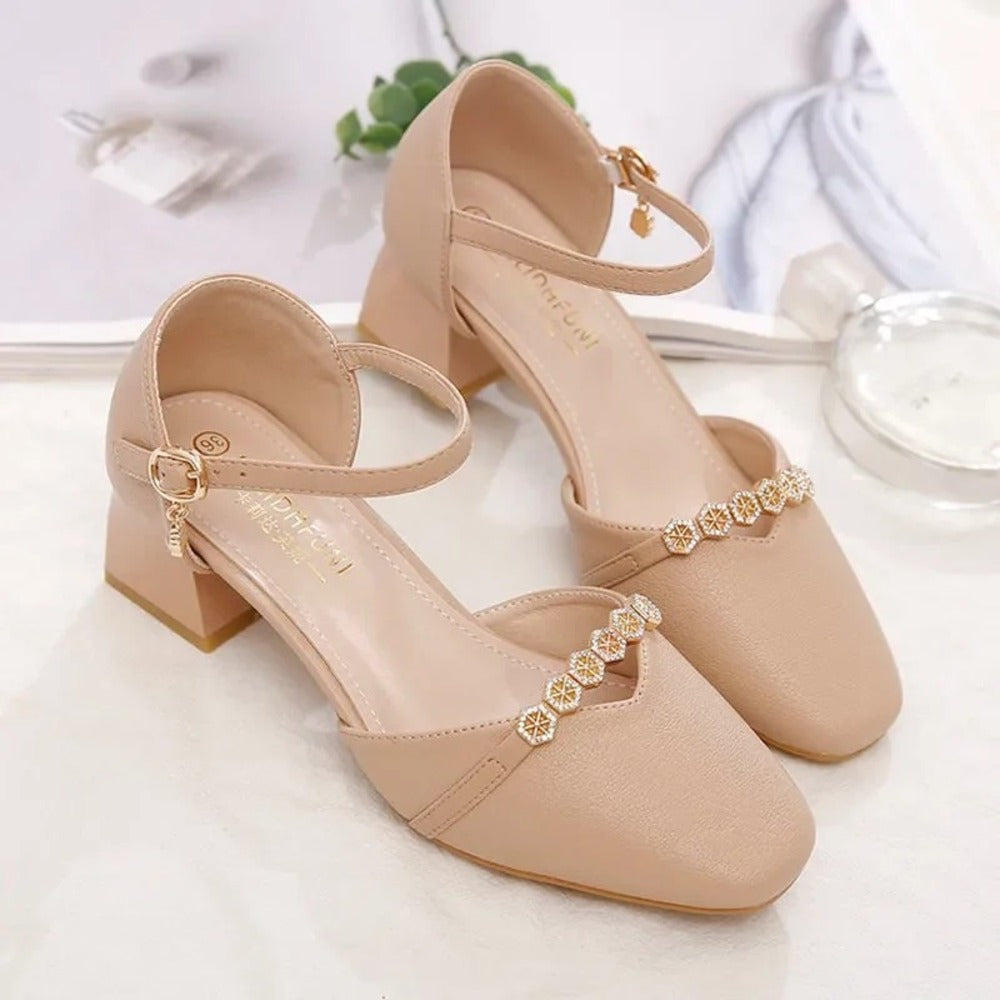 Beige women's pumps