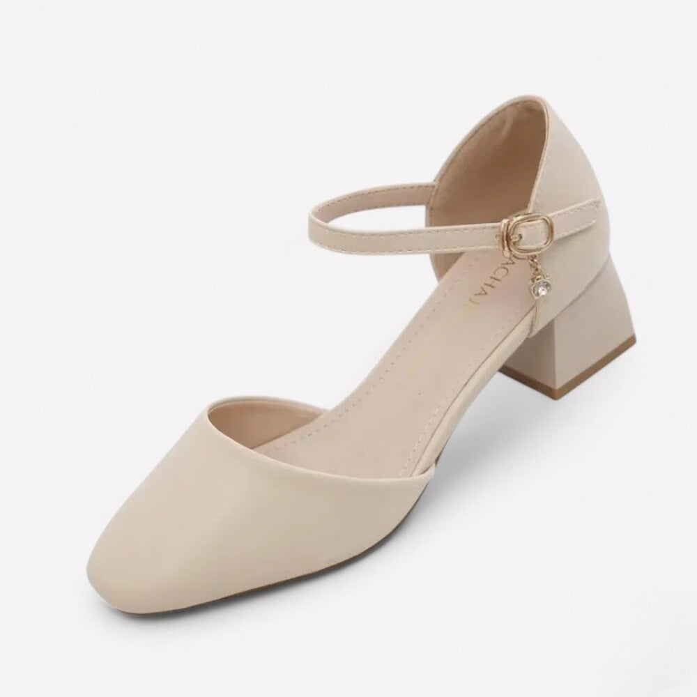 Beige women's pumps